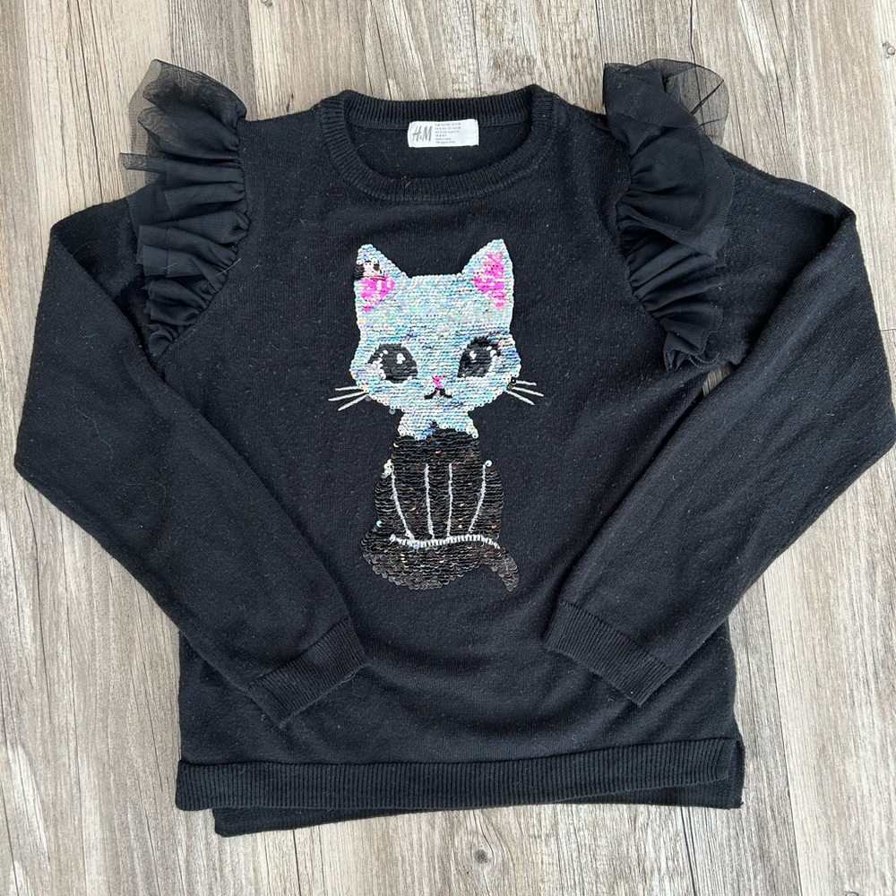 Girls H&M cat sequin shirt. The sequins turn black to silver as in picture.